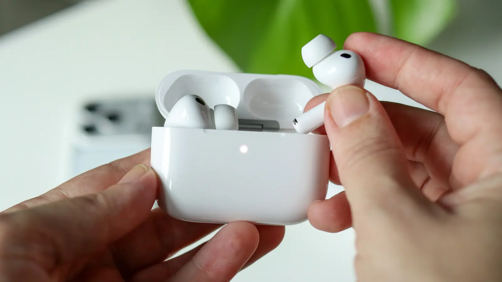 Here's What Those Tiny Holes On Your Earbuds Are For
